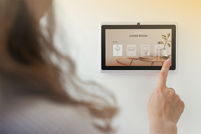 Smart home innovation technology with woman using control panel Smart home innovation